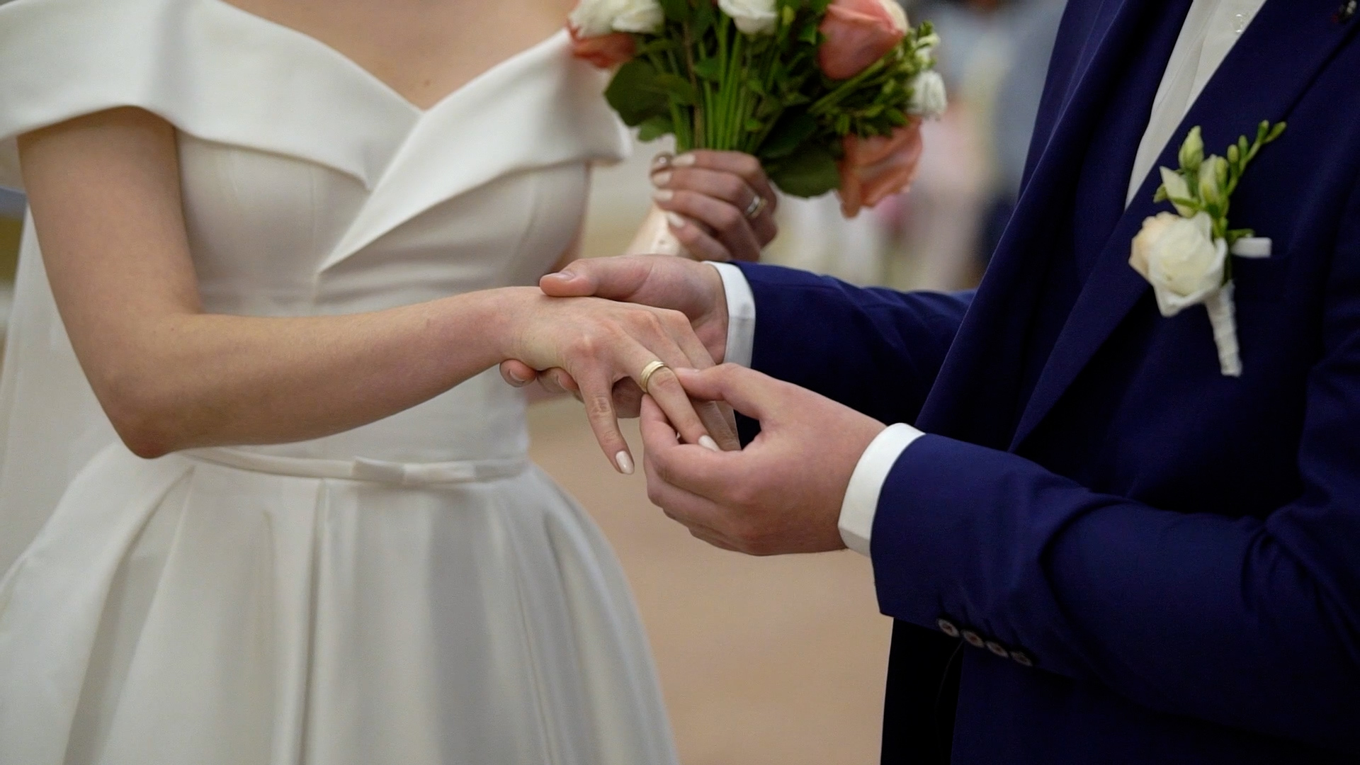 Couple exchanging rings